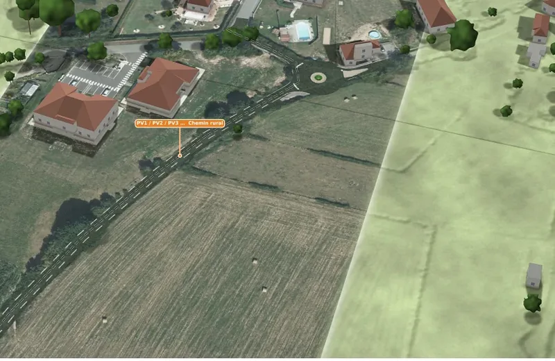 Vue aérienne d'un projet de voirie avec giratoire et chemin rural
